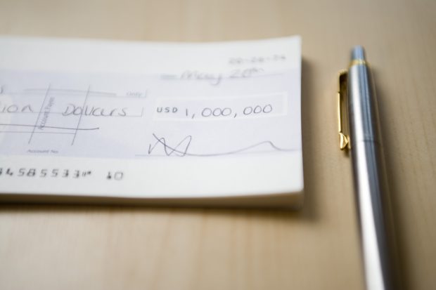 One million dollars cheque - schoolteacher first million dollars cheque